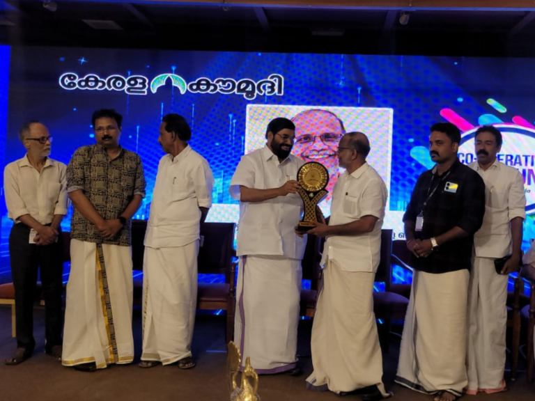 Award received from Minister V. N. Vasavan.